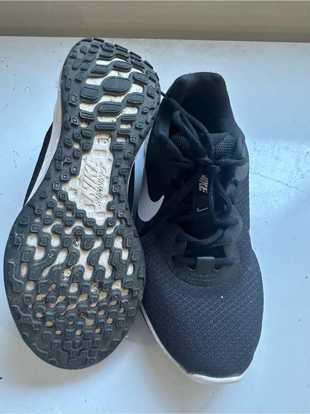 Nike Men's Black Athletic Running Shoes with White Swoosh